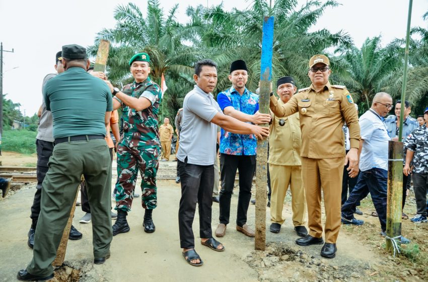  Bupati Batu Bara Buka Portal KAI di Desa Mekar Baru Guna Menyambut Era Baru Aksesibilitas dan Pertumbuhan Ekonomi