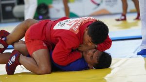  Pj. Bupati Langkat Berikan Medali kepada Juara Cabang Olahraga Sambo: Dorong Semangat Atlet Muda di Ajang Nasional
