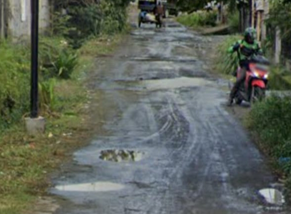  Jalan Rusak Total, Warga Desa Helvetia Minta Perumda Tirtanadi Tanggungjawab