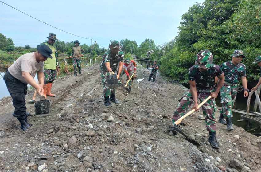  Satgas TMMD 126 Kodim 0201 Medan Kompak Ratakan Jalan di Paya Pasir