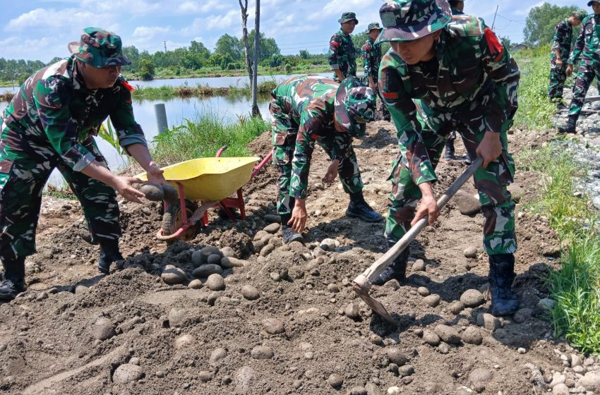  Gotong Royong Satgas TMMD dan Warga Wujudkan Jalan Tangguh di Medan Marelan